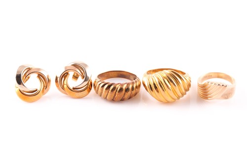 Lot 147 - An 18 ct yellow gold dress ring, the wide...