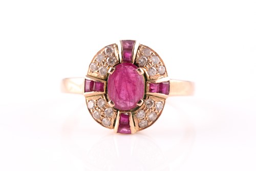 Lot 15 - A ruby and diamond cluster ring, the central...
