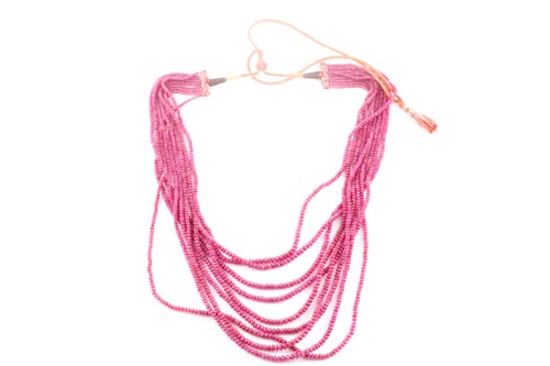 Lot 158 - An Indian ruby beaded necklace, set with nine...