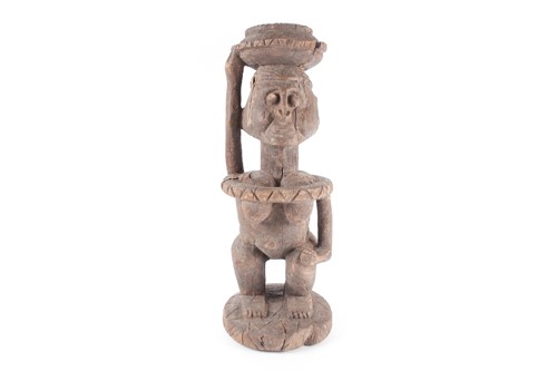Lot 172 - A Dogon female standing figure, Mali, carrying...