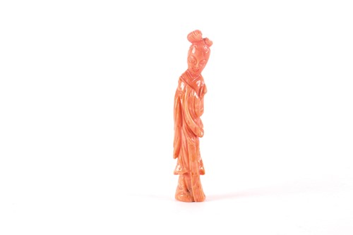 Lot 137 - A Chinese carved coral figure of Guanyin,...