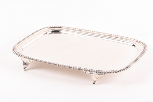 Lot 349 - A George III rectangular silver salver. London...