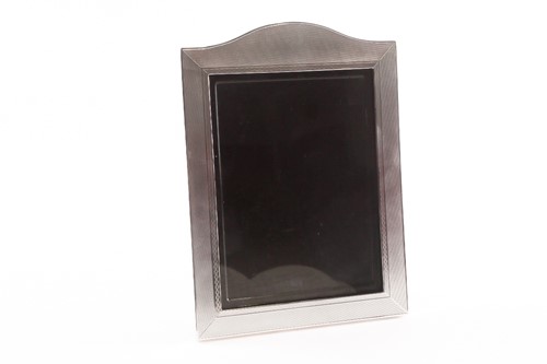 Lot 393 - An Art Deco silver photograph frame; probably...