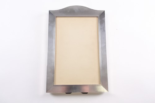 Lot 381 - A large Art Deco silver photograph frame;...