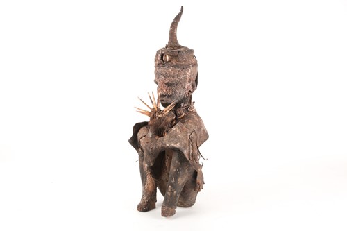 Lot 175 - A Songye seated power figure, Nikisi,...