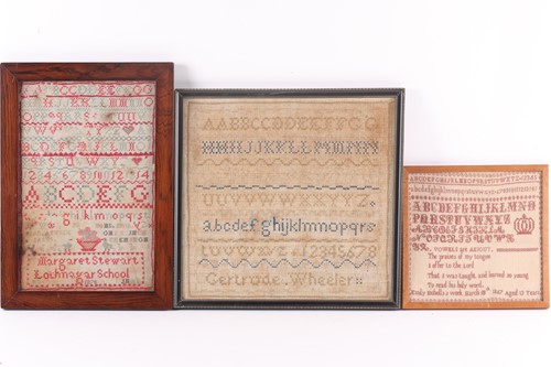 Lot 257 - A Vivtorian needlework alpha numerical sampler,...