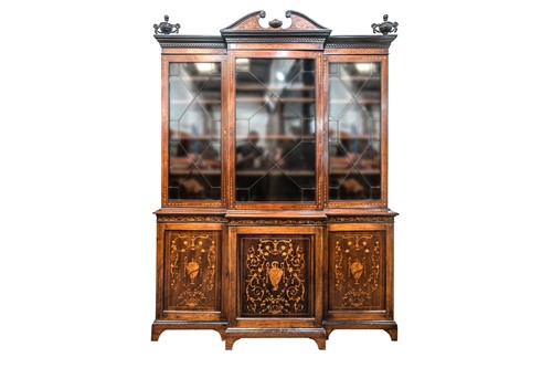 Lot 86 - A George III style mahogany breakfront...