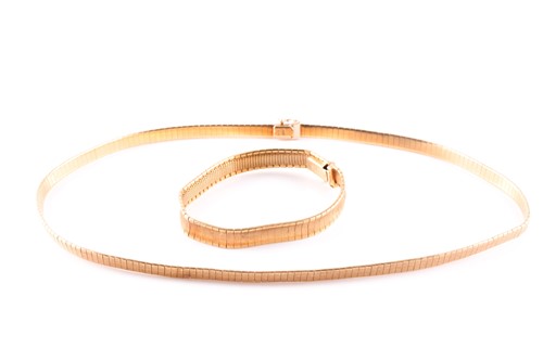 Lot 311 - An 18ct yellow gold necklet, of articulated...