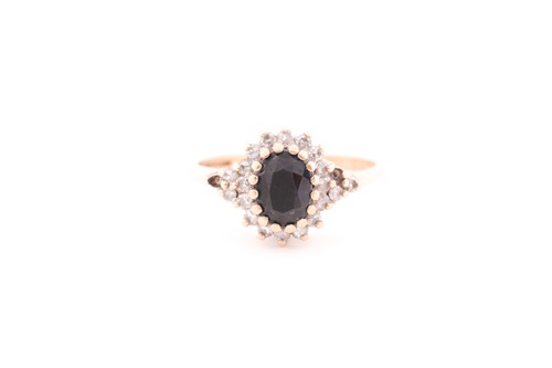 Lot 160 - A yellow metal, diamond and sapphire cluster...