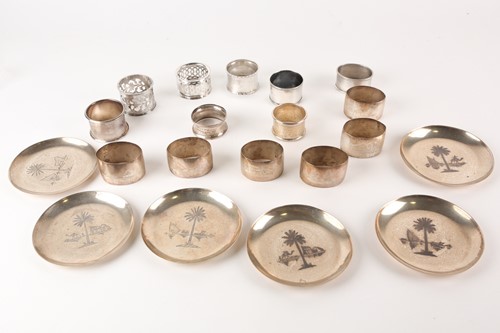 Lot 437 - A small collection of eight silver napkin...