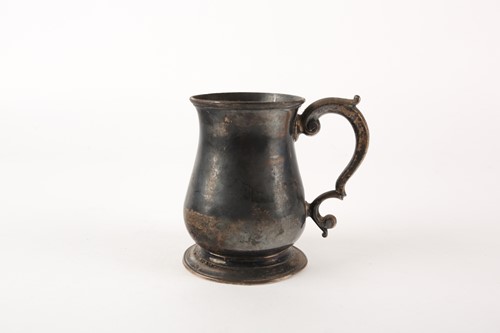 Lot 422 - A George II silver baluster tankard. London...
