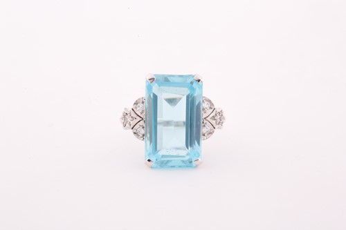 Lot 149 - A diamond and blue topaz cocktail ring, set...