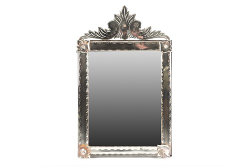 Lot 346 - A Venetian dressing table mirror, with scroll...