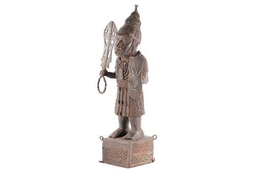 Lot 177 - A Benin bronze standing warrior figure,...
