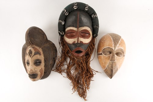 Lot 187 - A Tsogo mask, Gabon, the sectioned face...