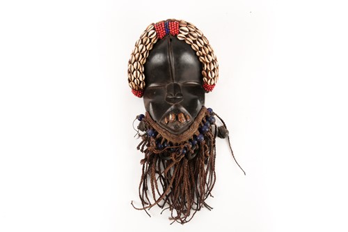 Lot 189 - A Dan mask, Liberia/Ivory Coast, a cushioned...