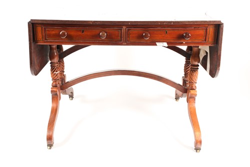 Lot 288 - A Regency brass inlaid mahogany two flap sofa...