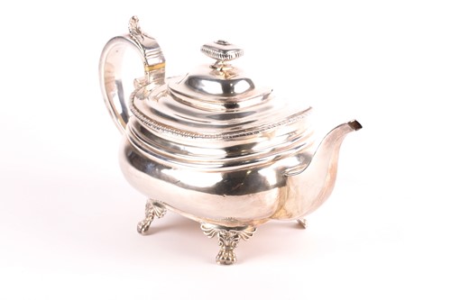 Lot 375 - A late Georgian silver teapot, marks rubbed,...