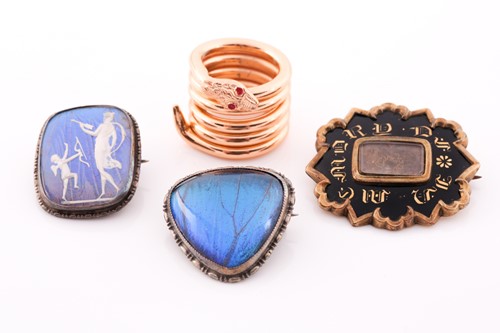 Lot 147 - A Victorian gilt metal and enamel mourning...