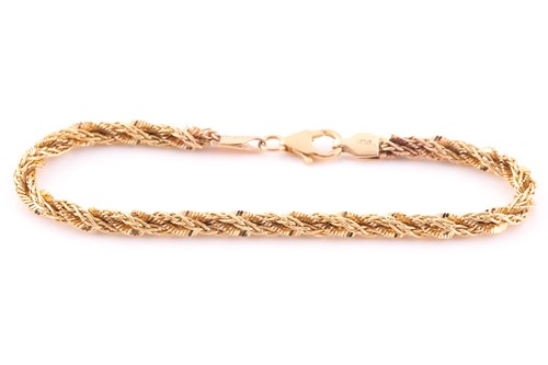 Lot 137 - A multi-strand rope twist bracelet; with...