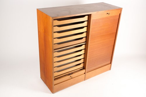 Lot 315 - A 1960s Danish teak veneered tambour fronted...