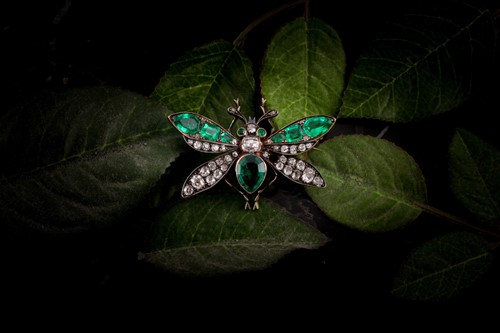 Lot 158 - A Victorian diamond and emerald insect brooch...