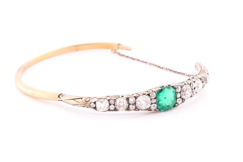 Lot 232 - A Victorian yellow gold, diamond, and emerald...