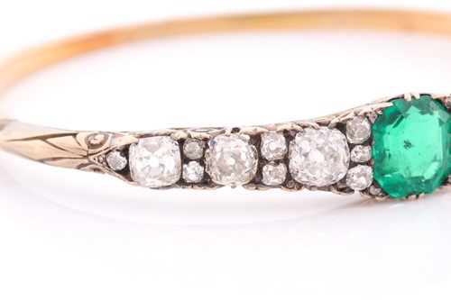 Lot 232 - A Victorian yellow gold, diamond, and emerald...