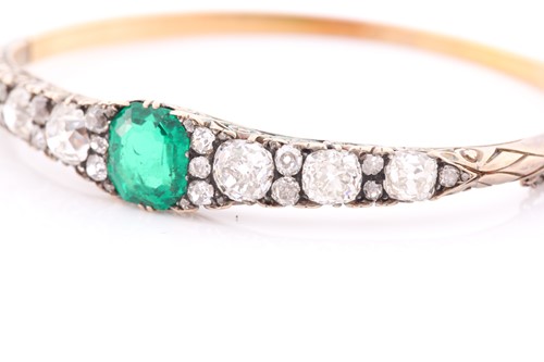 Lot 232 - A Victorian yellow gold, diamond, and emerald...