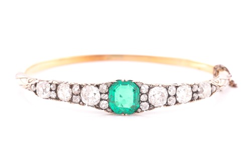 Lot 232 - A Victorian yellow gold, diamond, and emerald...
