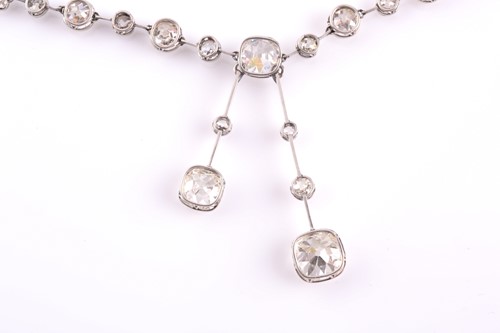 Lot 110 - An impressive antique collet-set diamond...