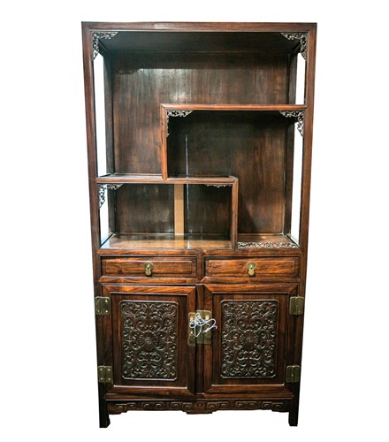 Lot 137 - A Chinese carved and pierced rosewood cabinet,...