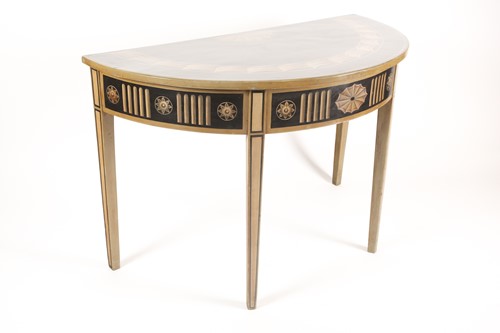 Lot 323 - A Sheraton style pale green and black painted...