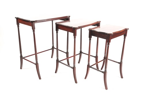 Lot 334 - A nest of three cartouch topped mahogany inner...