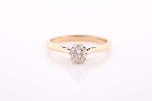 Lot 109 - An 18ct yellow gold and solitaire diamond ring,...