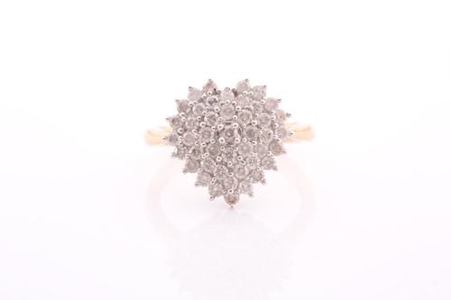 Lot 363 - An 18ct yellow gold and diamond ring, the...