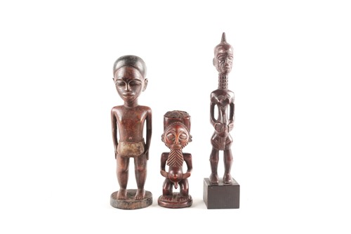 Lot 203 - A Hemba standing male power figure, Democratic...