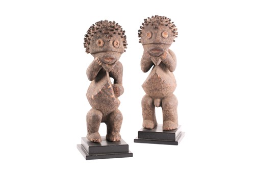 Lot 210 - Mambila standing male and female figures,...