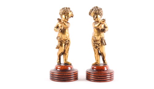 Lot 212 - After Clodion, a pair of gilt bronze figures...