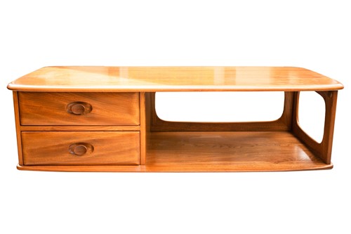 Lot 330 - An Ercol golden dawn light elm lozenge form...