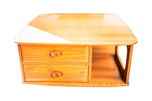 Lot 336 - An Ercol golden dawn light elm square "Pandora"...
