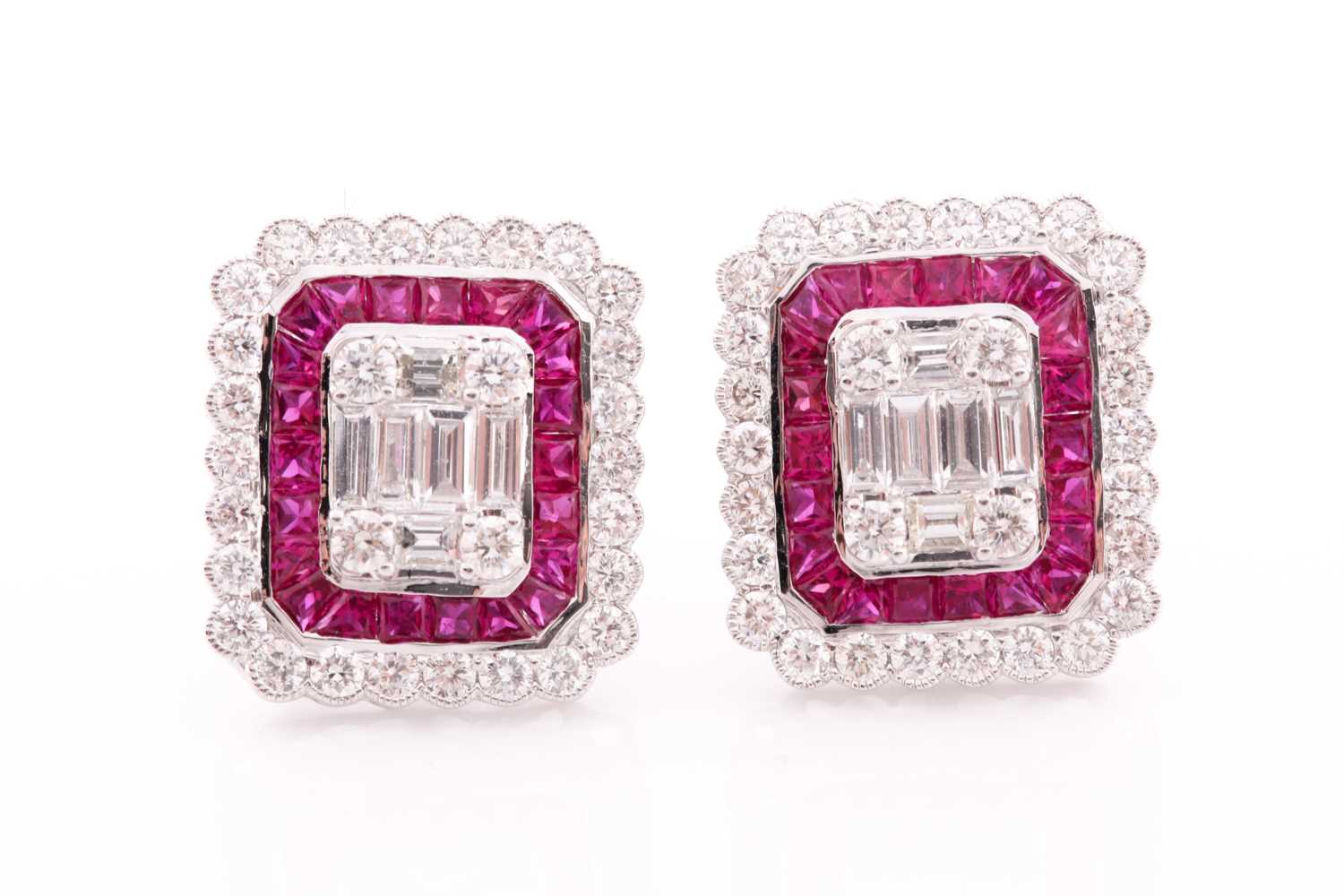 Lot 287 - A pair of diamond and ruby earrings, the...