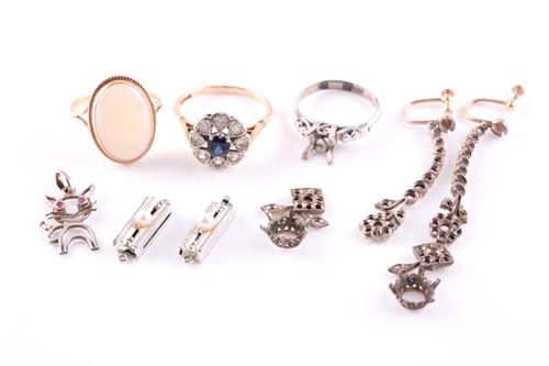 Lot 13 - A 9ct yellow gold and opal ring, the opal...
