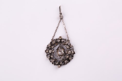Lot 290 - A 19th century white metal and paste pendant,...