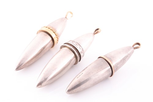 Lot 83 - A silver gilt torpedo-shaped pendant,...