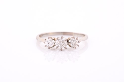 Lot 20 - An 18ct white gold and diamond ring, set with...