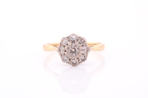 Lot 213 - An 18ct yellow gold and diamond cluster ring,...