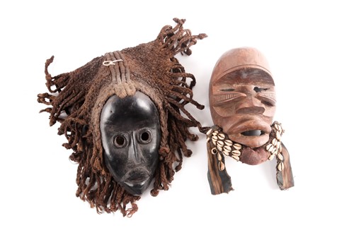 Lot 216 - A Guere mask, Ivory Coast, the recessed eye...