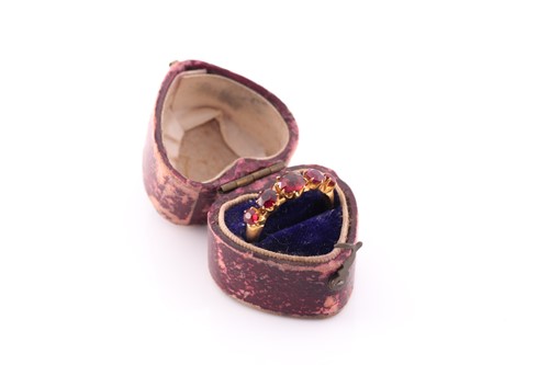Lot 171 - A yellow metal and garnet ring, the five round-...