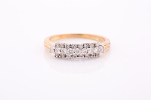 Lot 156 - An 18ct yellow gold and diamond ring, set with...